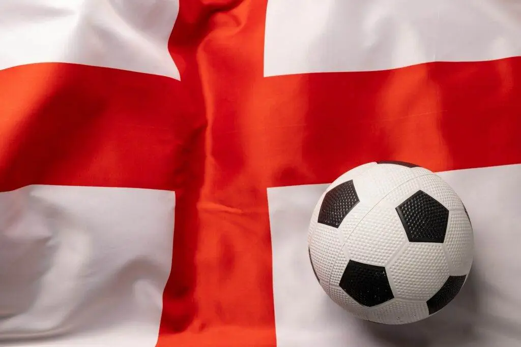 Composition of football over national flag of england
